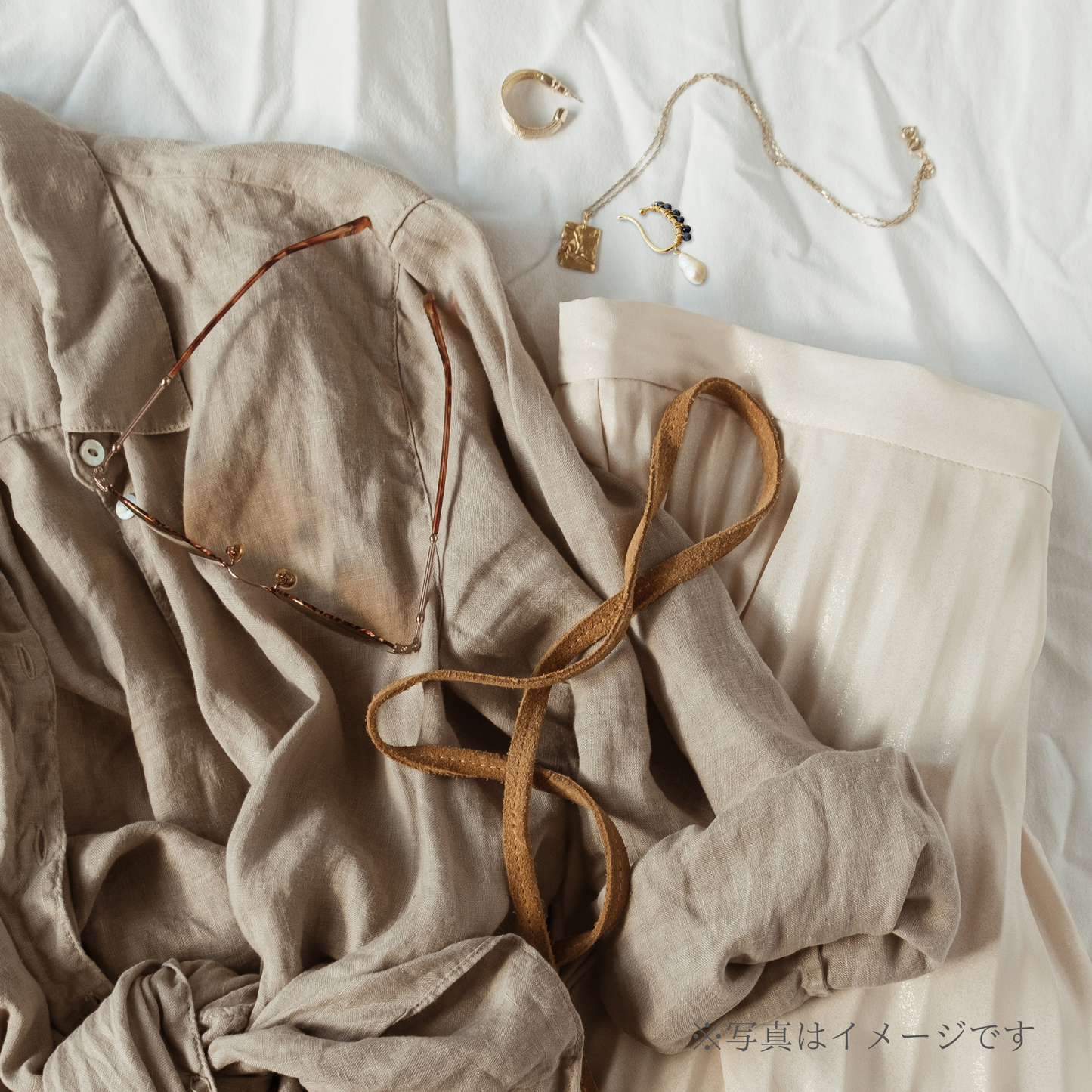 〜9月の誕生石〜 海の宝石ブルーの輝きサファイアのイヤーカフ